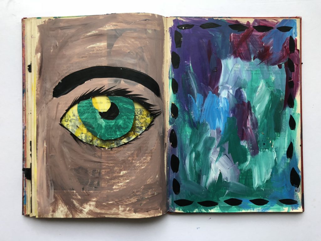 4 of 4. Cut through art journaling page of an eye and flower petals.